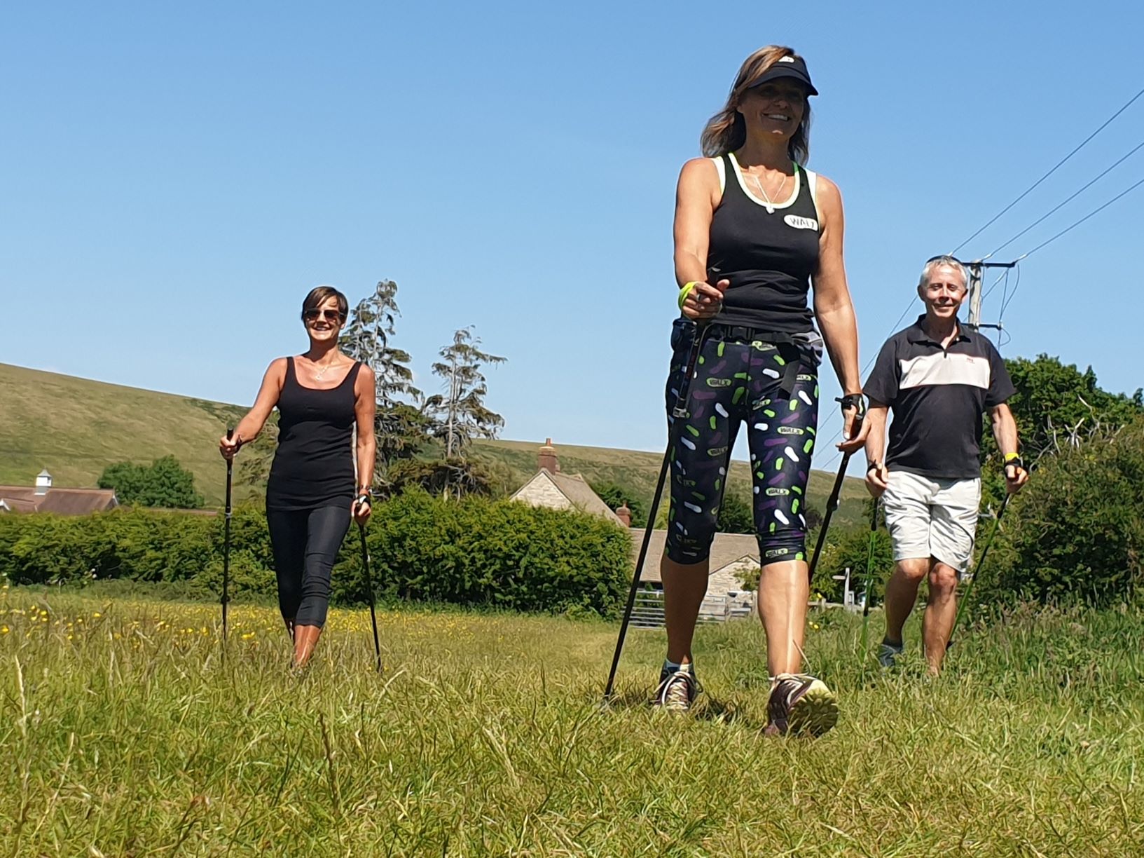 A WALX Instructor teaching Power of Poles